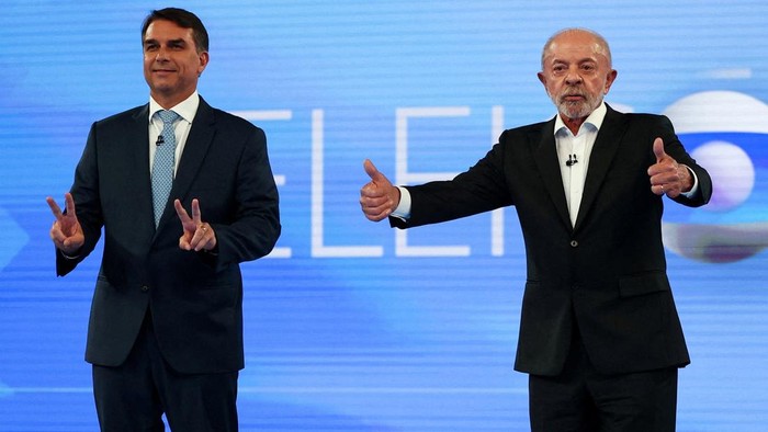 flavio-bolsonaro-kiri-dan-pesiden-brasil-luiz-inacio-lula-da-silva-saat-menghadiri-debat-capres-terakhir-pada-jumat-2310-waktu-1792840023761_169