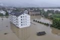 Jejak Topan Lumba-lumba, Banjir Rendam Kota Pesisir Yuhuan China