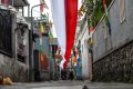 Sambut HUT RI, Warga Sulap Jalan Permukiman Jadi Lorong Merah Putih
